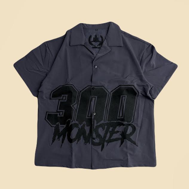 Monster in Saudi button up shirt